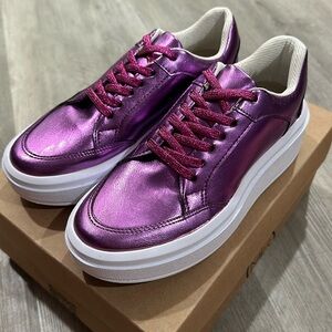 Makers adele purple. Brand new in box.